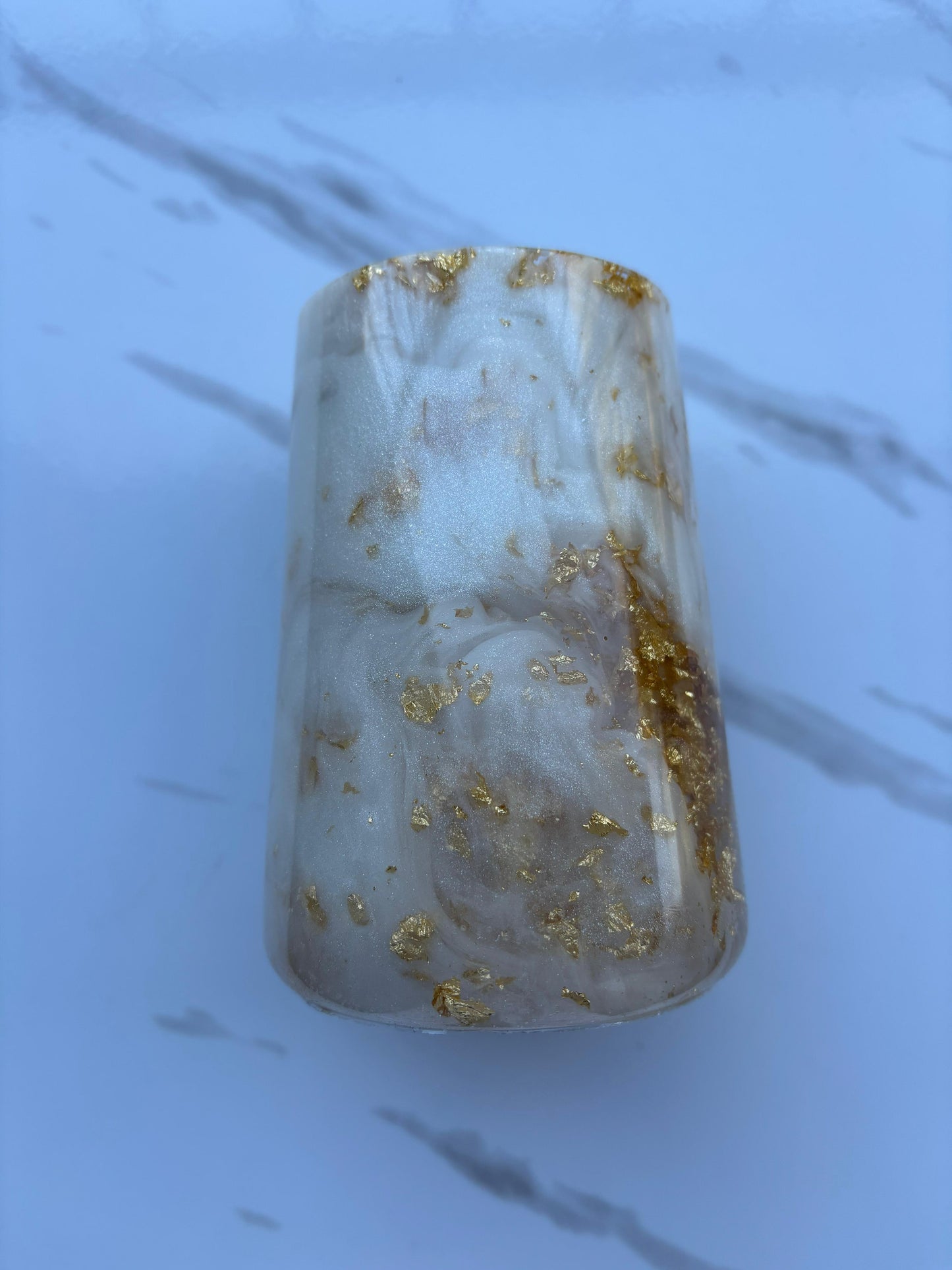 Gold and White Holder